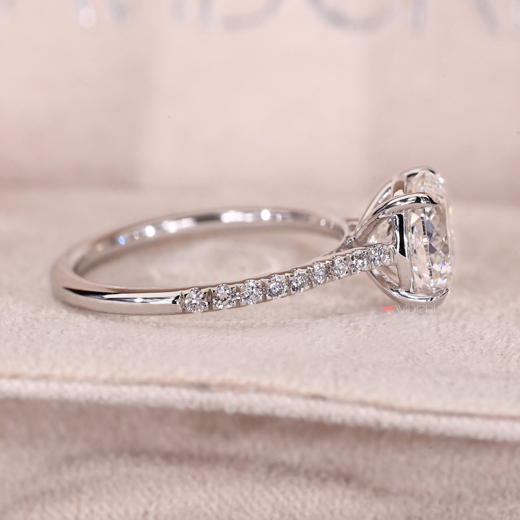 Custom Avideri engagement ring with round cut diamonds.
