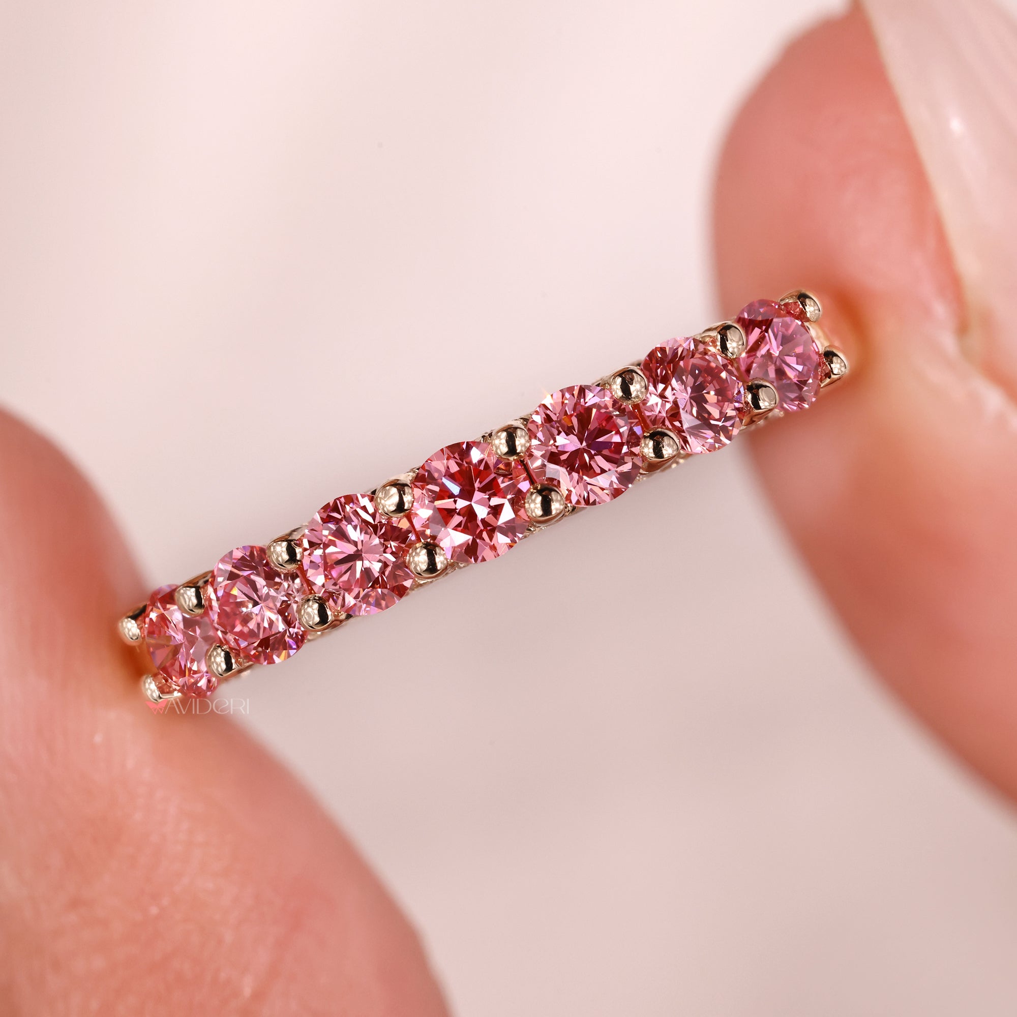 Custom wedding band in pink diamond wedding band style.
