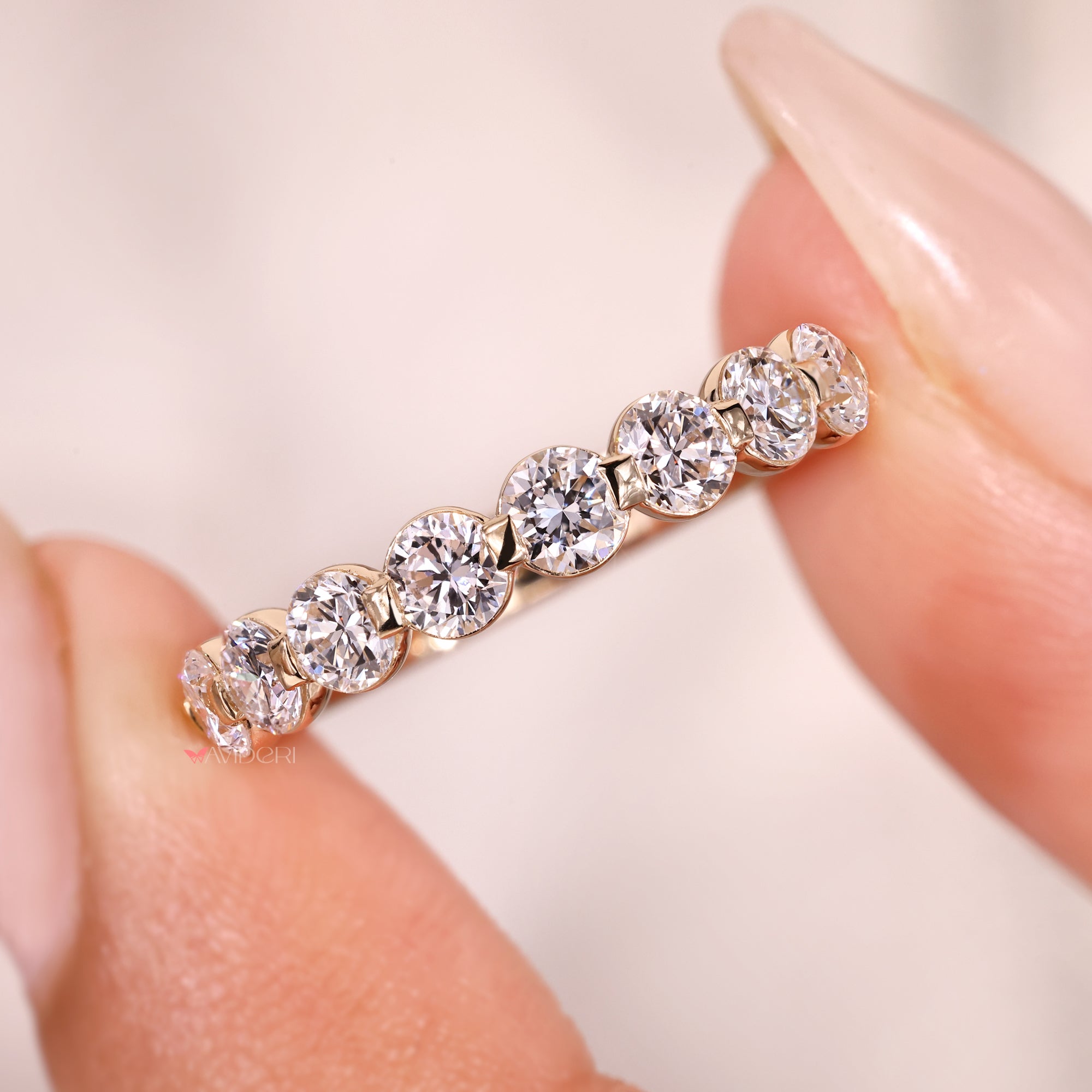 Round diamond wedding band with shared prong eternity band.