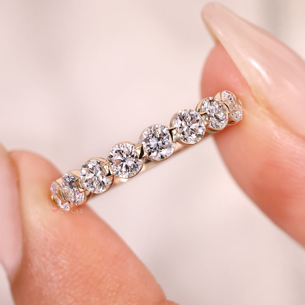 Round diamond wedding band with shared prong eternity band.