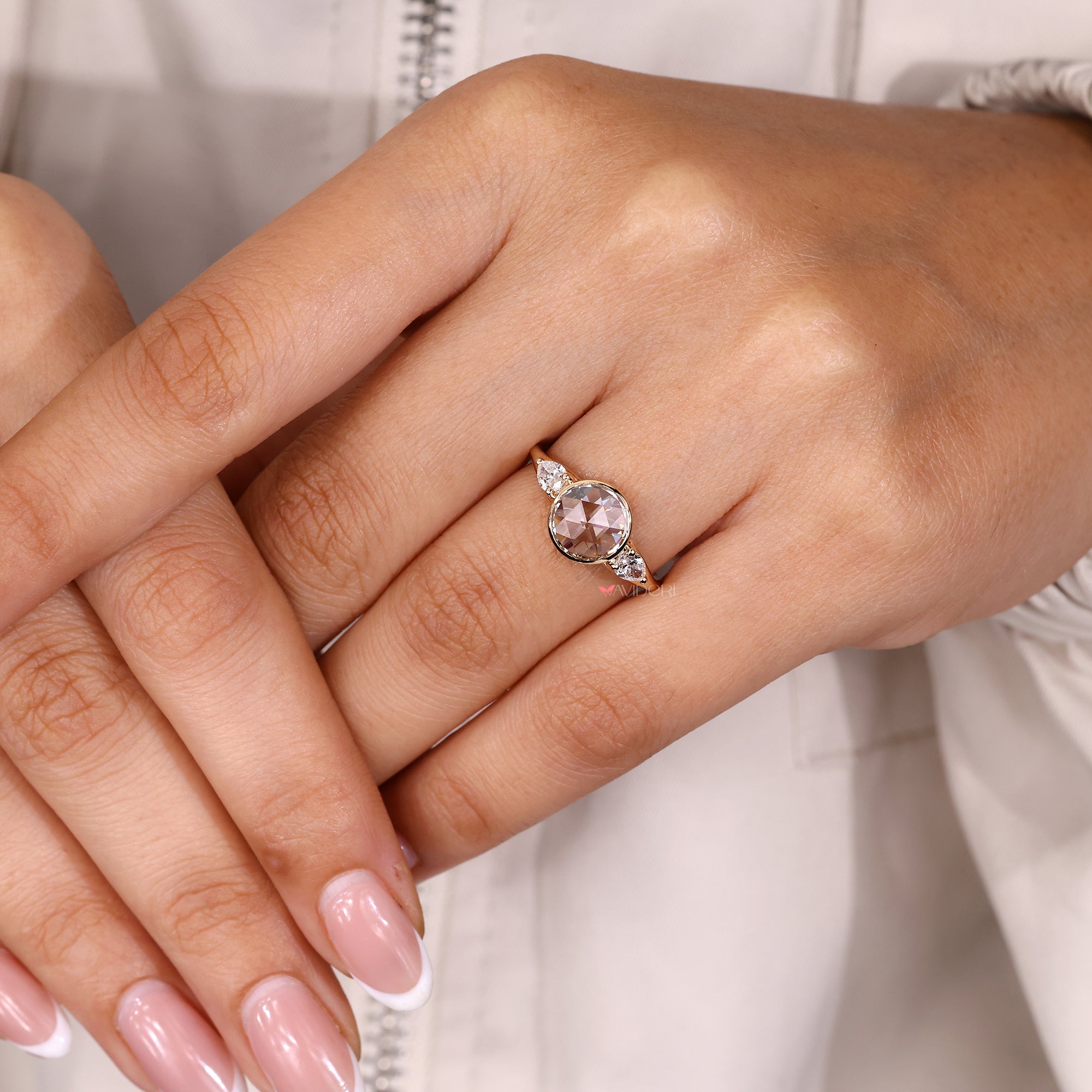 Avideri engagement ring on round rose cut diamond ring.