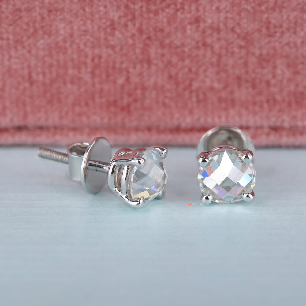 The checkerboard round earrings feature a creative design.