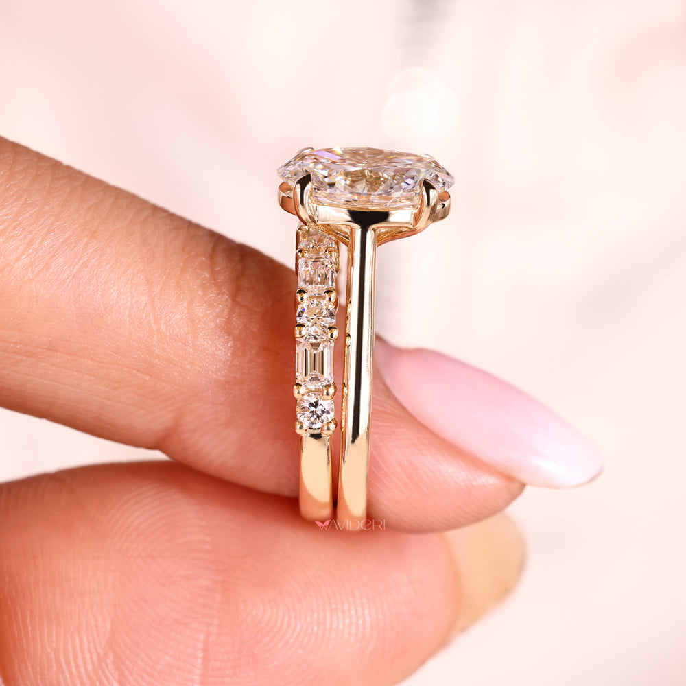 Handmade oval diamond ring with half eternity band.