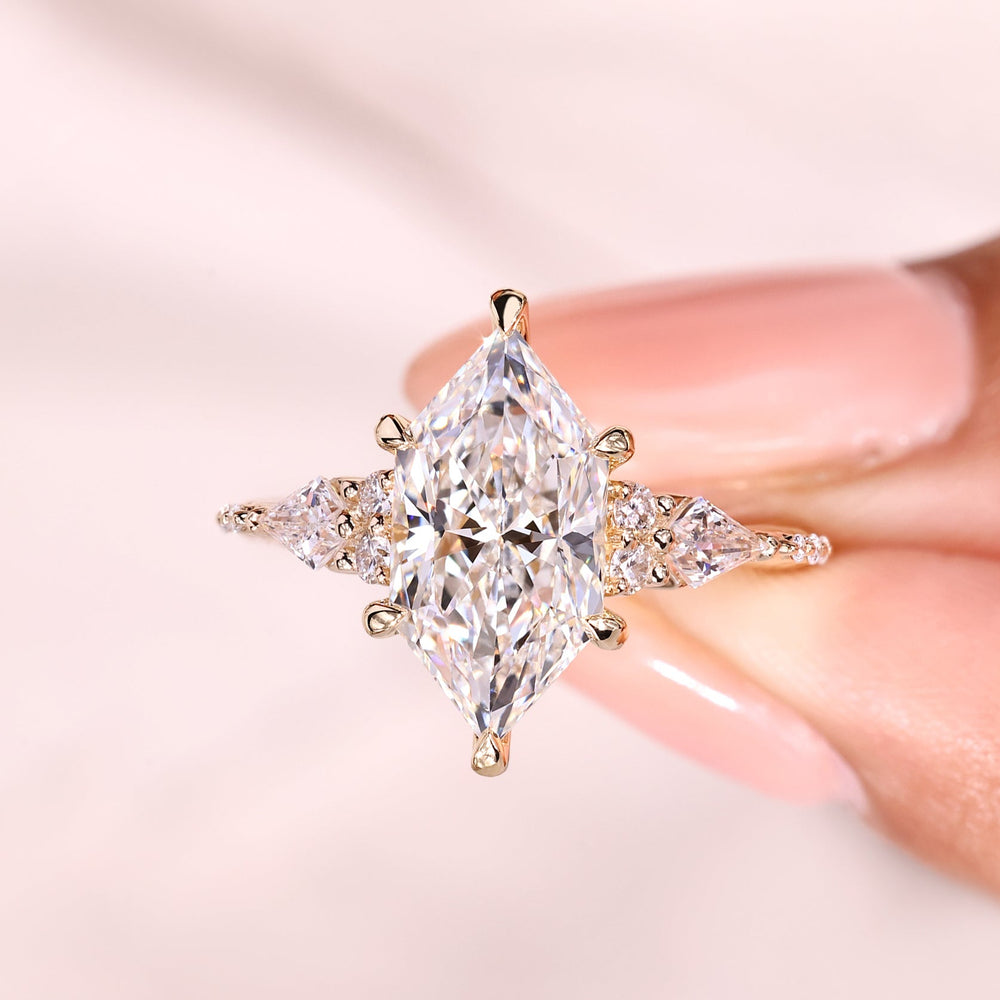 V prong marquise moissanite ring with halo style.
