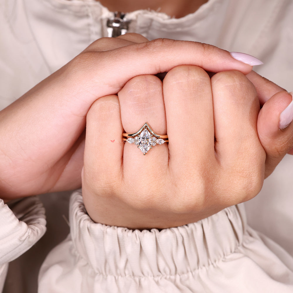 Engagement ring with muse setting side stones.
