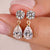 Dangle and drop earrings in round and pear diamond earrings.