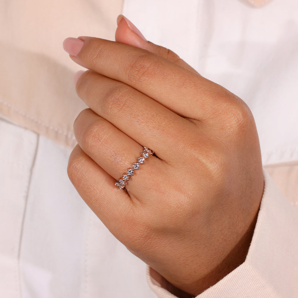 Compass prong band with a modern design and diamonds.
