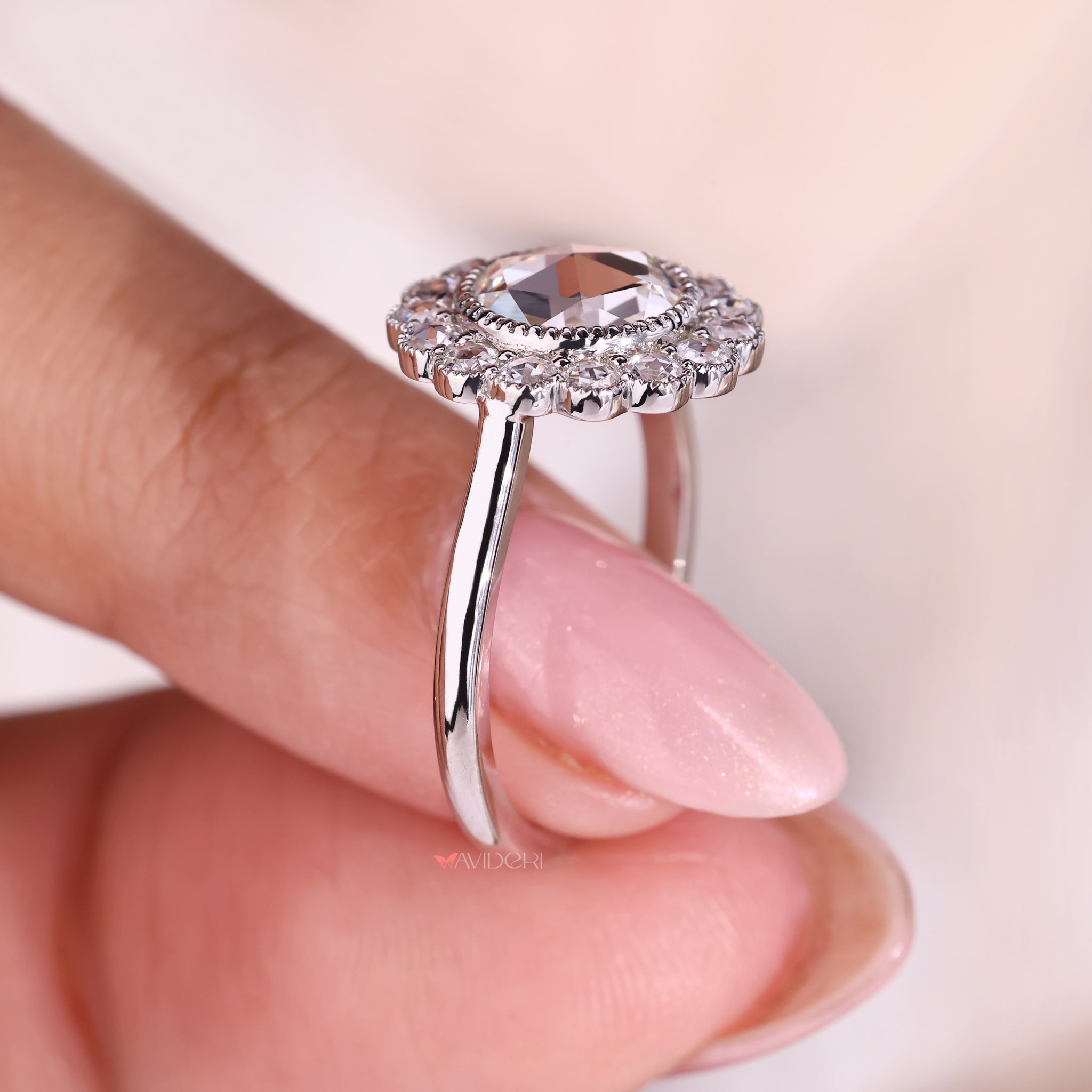 White Gold Ring with a round cut diamond, offering a sleek and modern style.