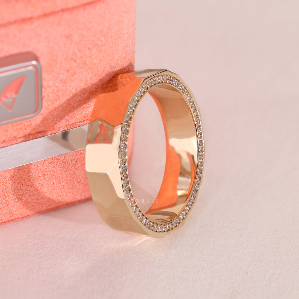 Lab grown diamond eternity band with hammered texture finish.
