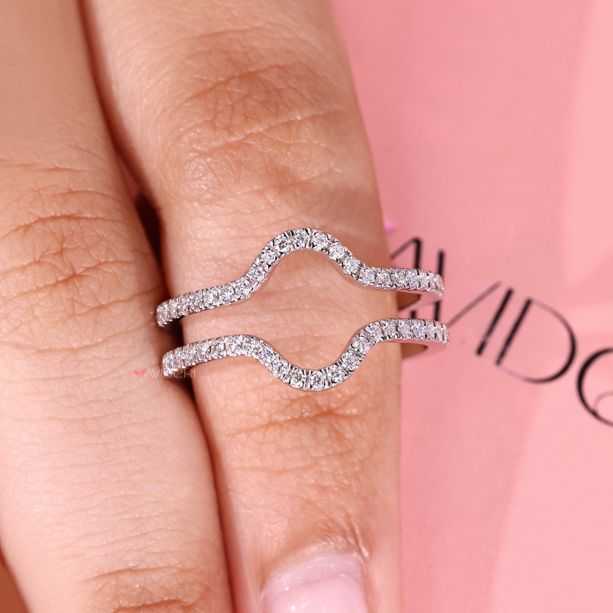 Wrap guard wedding band with diamond detail.

