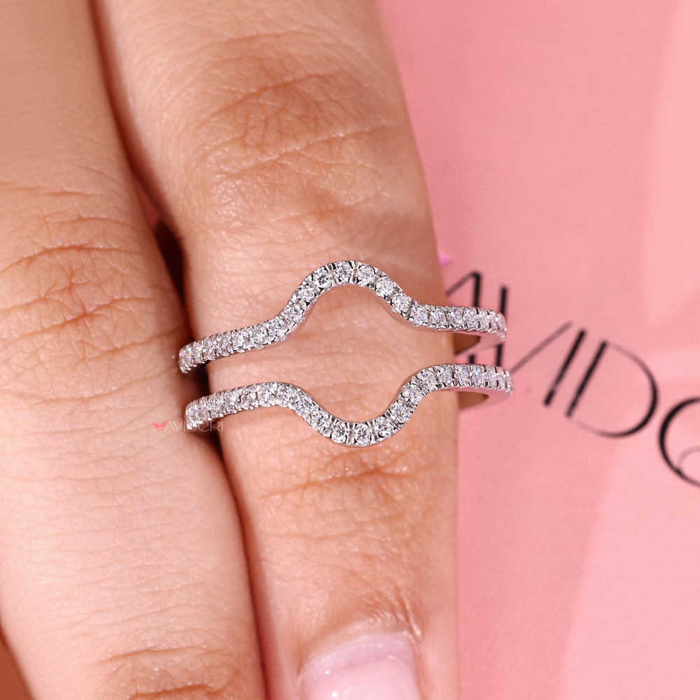 Wrap guard wedding band with diamond detail.
