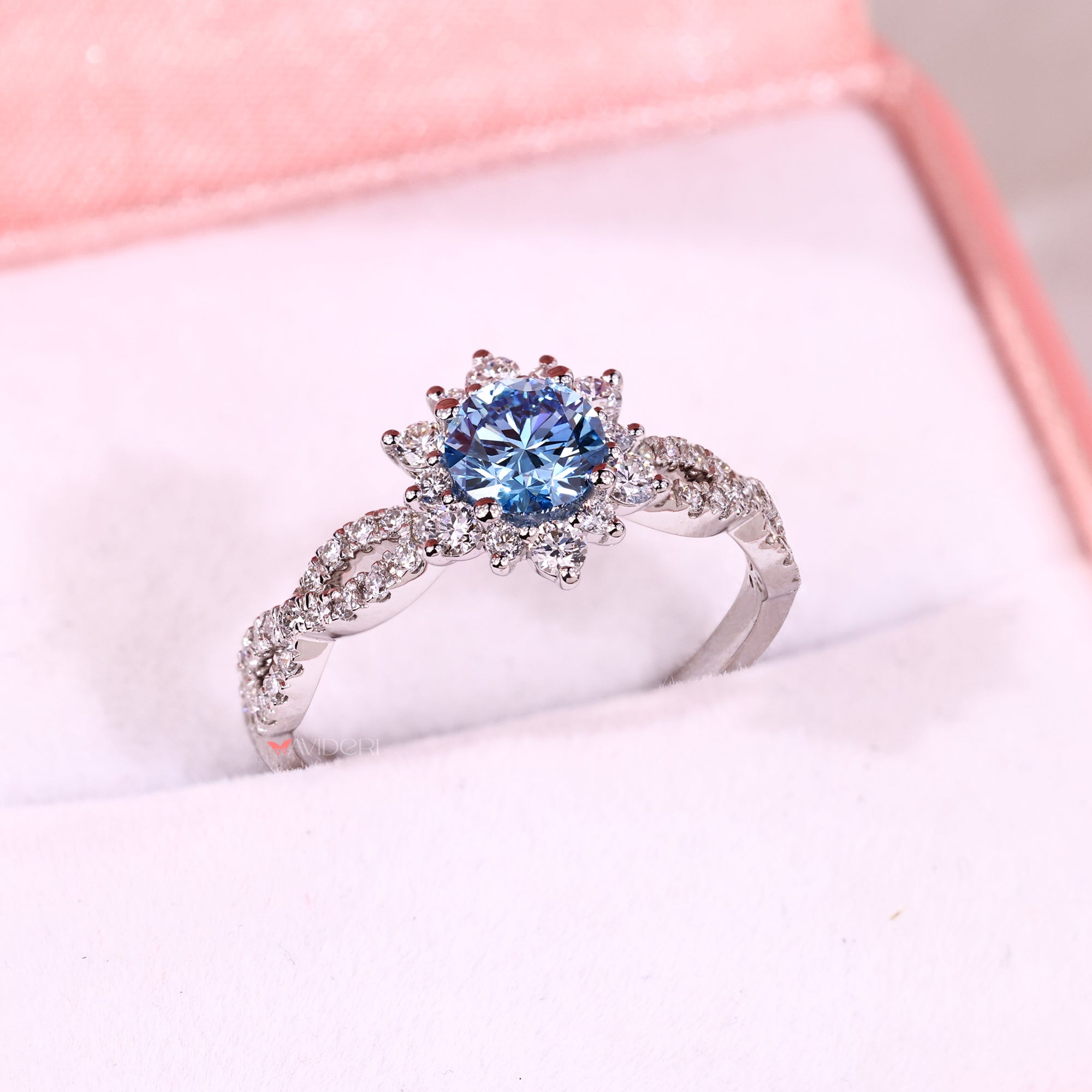 Handmade jewelry blue diamond engagement ring.
