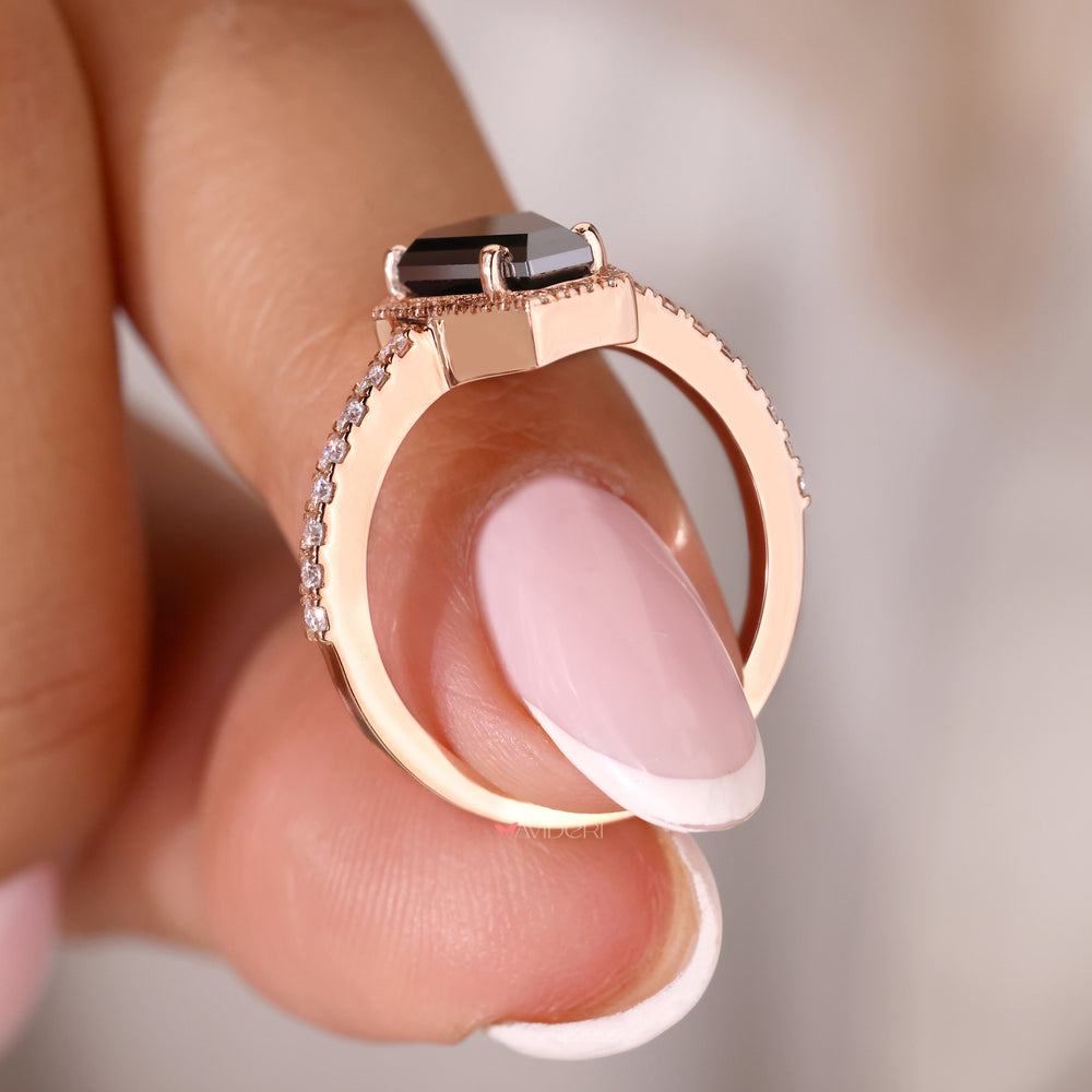 Stunning pave moissanite ring with intricate detailing.
