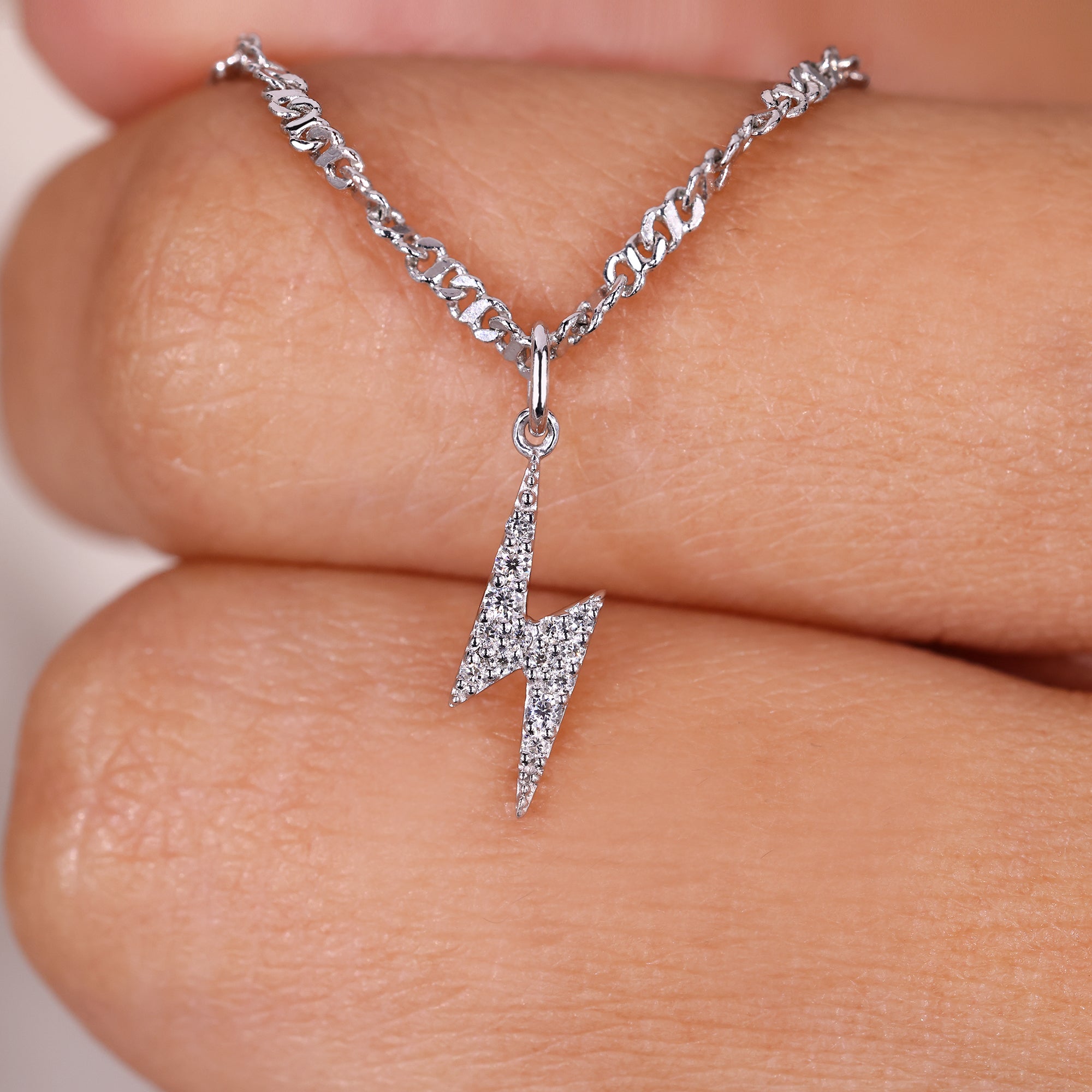 Round cut pendant featuring clean, timeless lines.