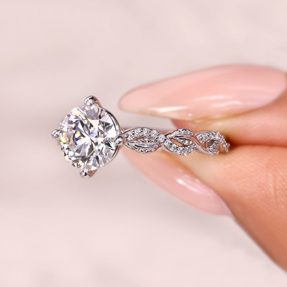 Nature inspired round diamond ring cathedral.
