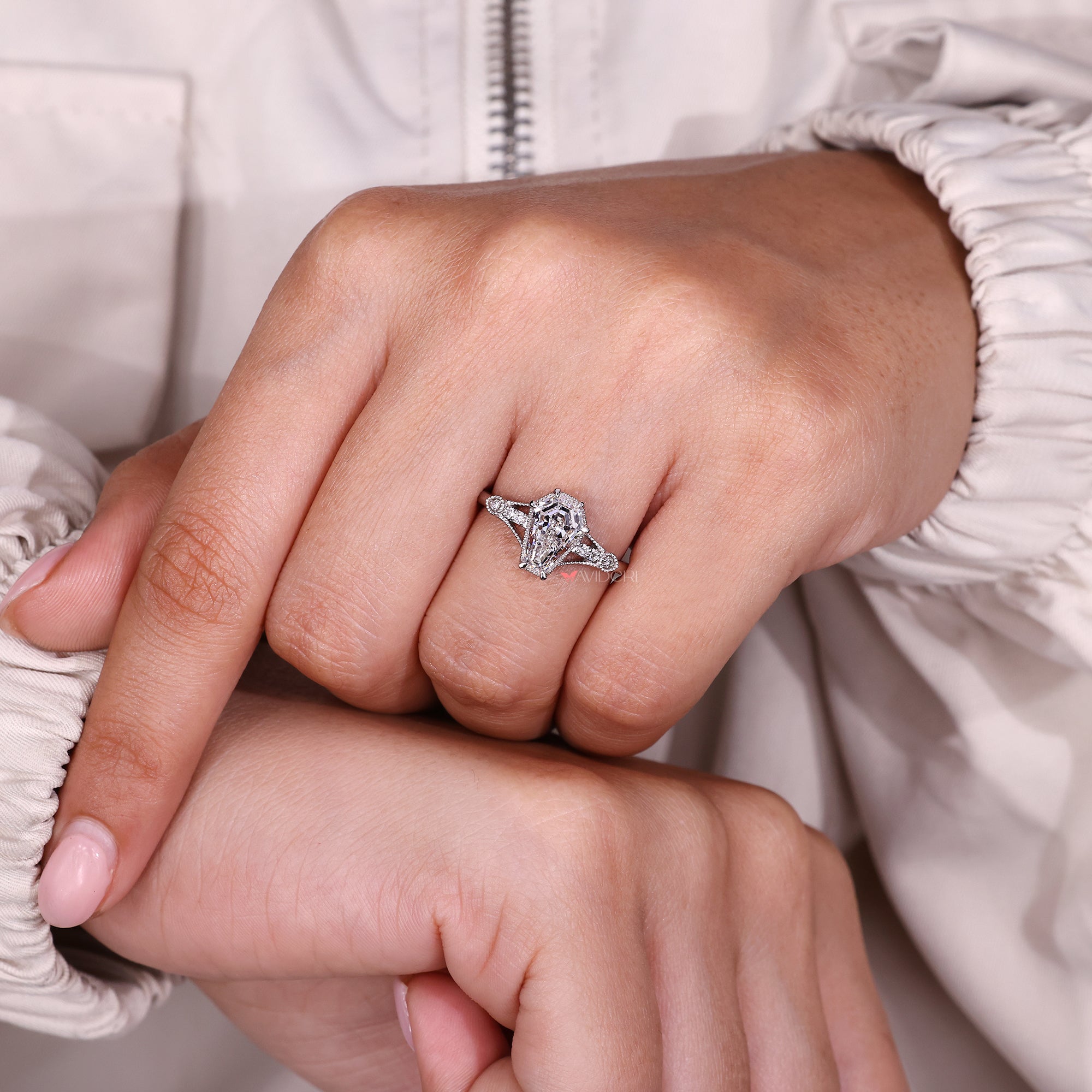 Six claw prong setting with white gold diamond ring.