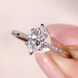 4 claw prong setting on marquise cut diamond engagement ring.