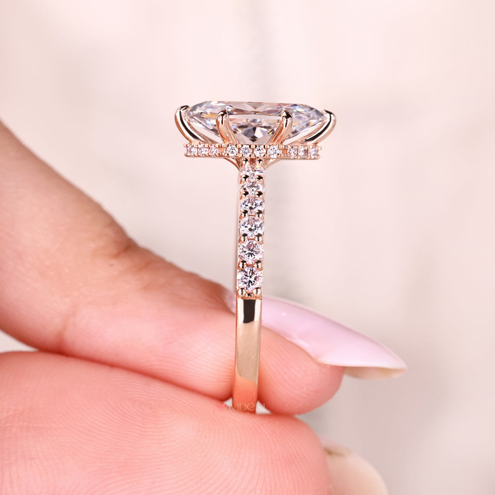 Dutch marquise diamond ring cathedral setting.
