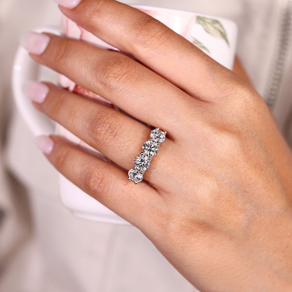 Half eternity round diamond band with u prong pave.
