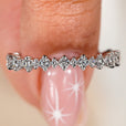 Handmade jewelry featuring a stunning round diamond wedding band
