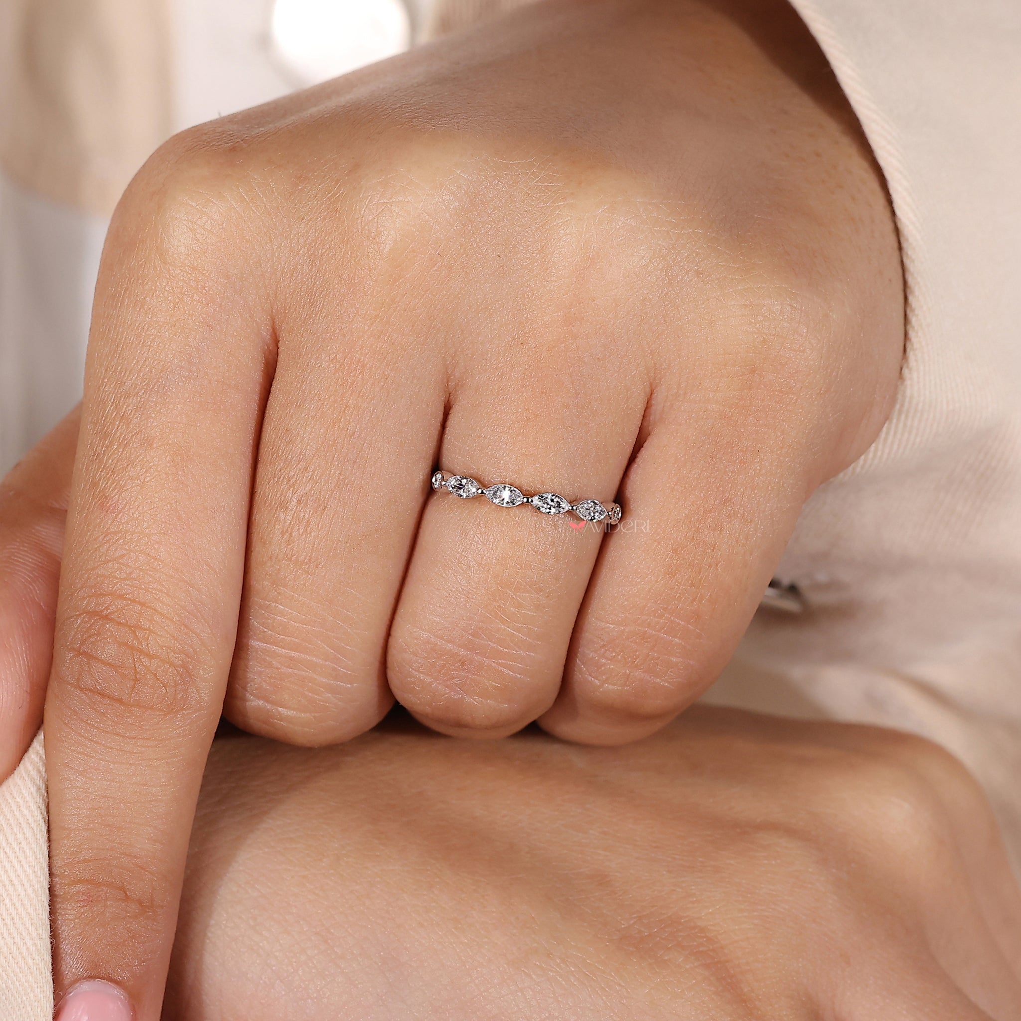 Bezel set wedding band offering a unique design for lasting brilliance

