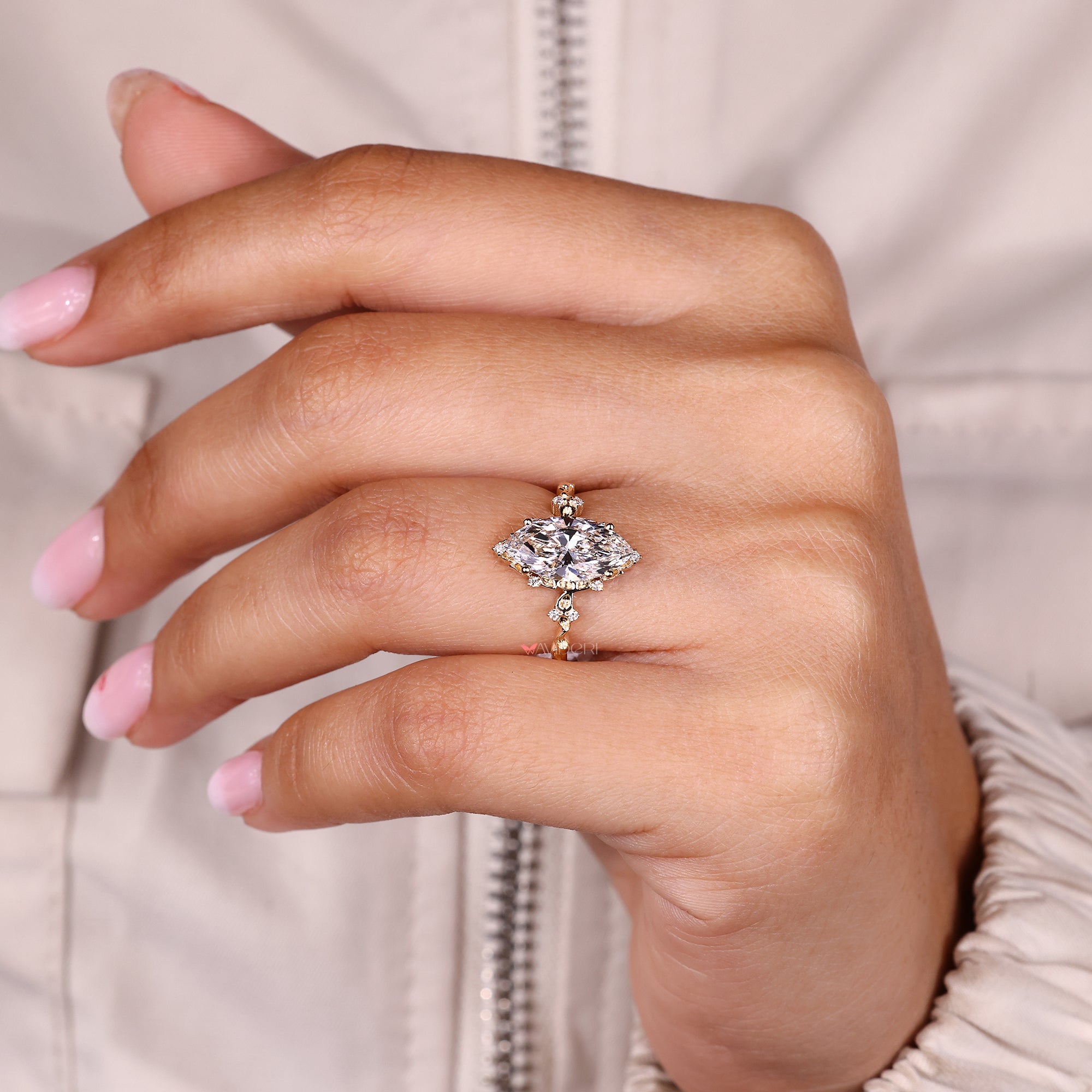 Lab grown diamond cluster engagement ring.