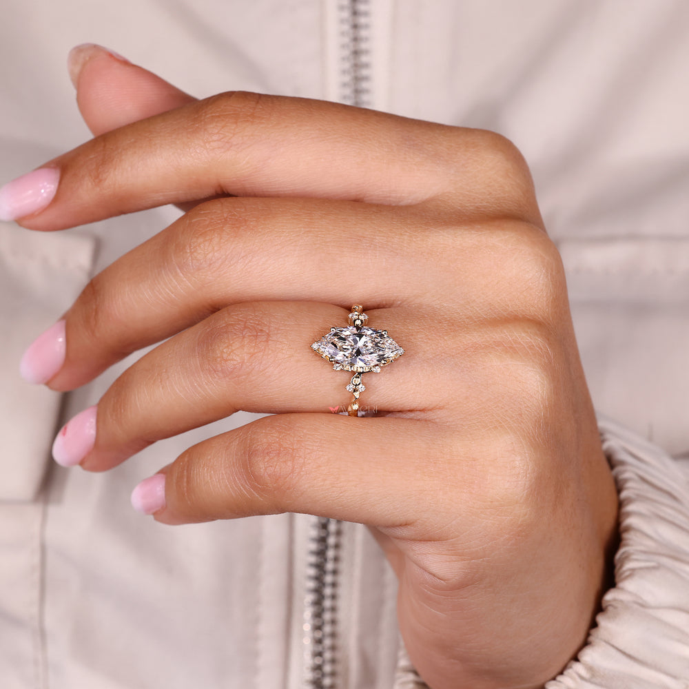 Lab grown diamond cluster engagement ring.