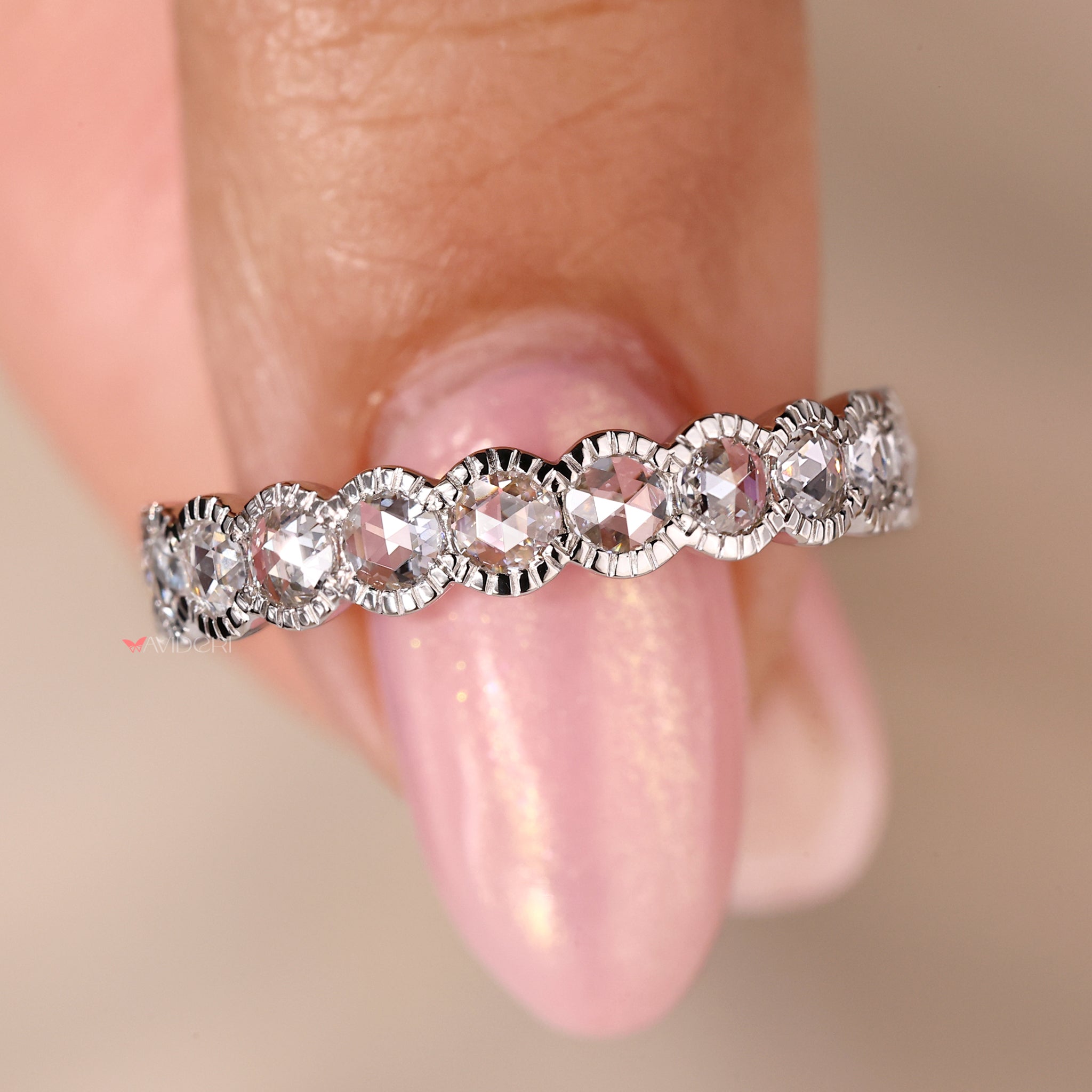 Milgrain diamond wedding band with round diamonds for extra brilliance.
