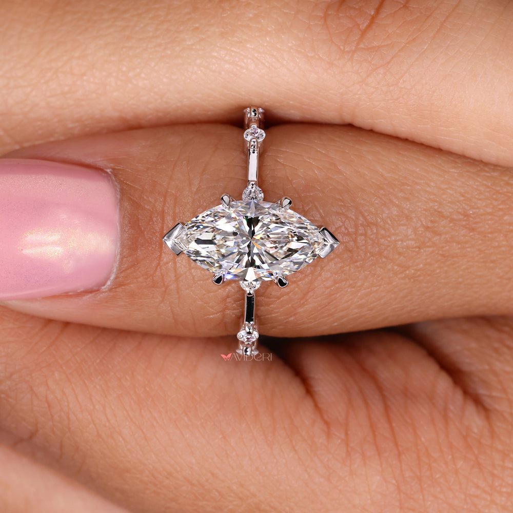 Antique design ring made with moissanite and gold.
