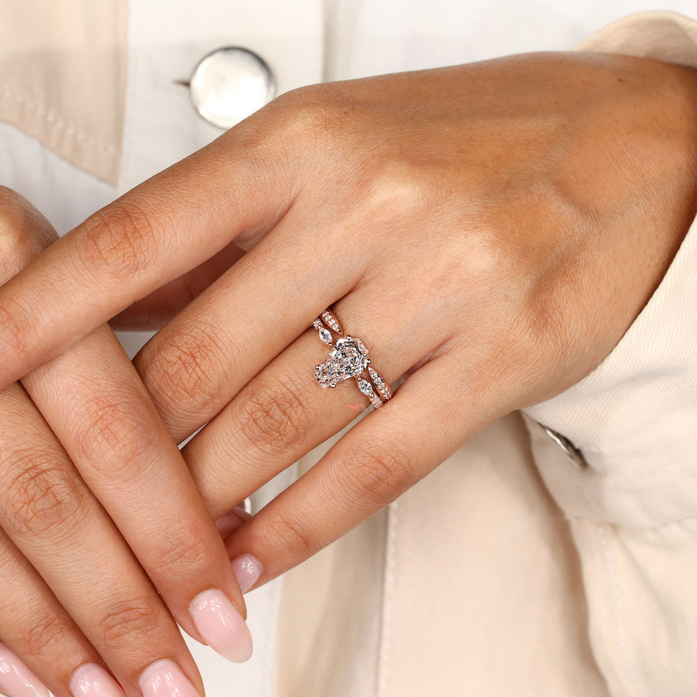 Open gap wedding band with round diamonds.
