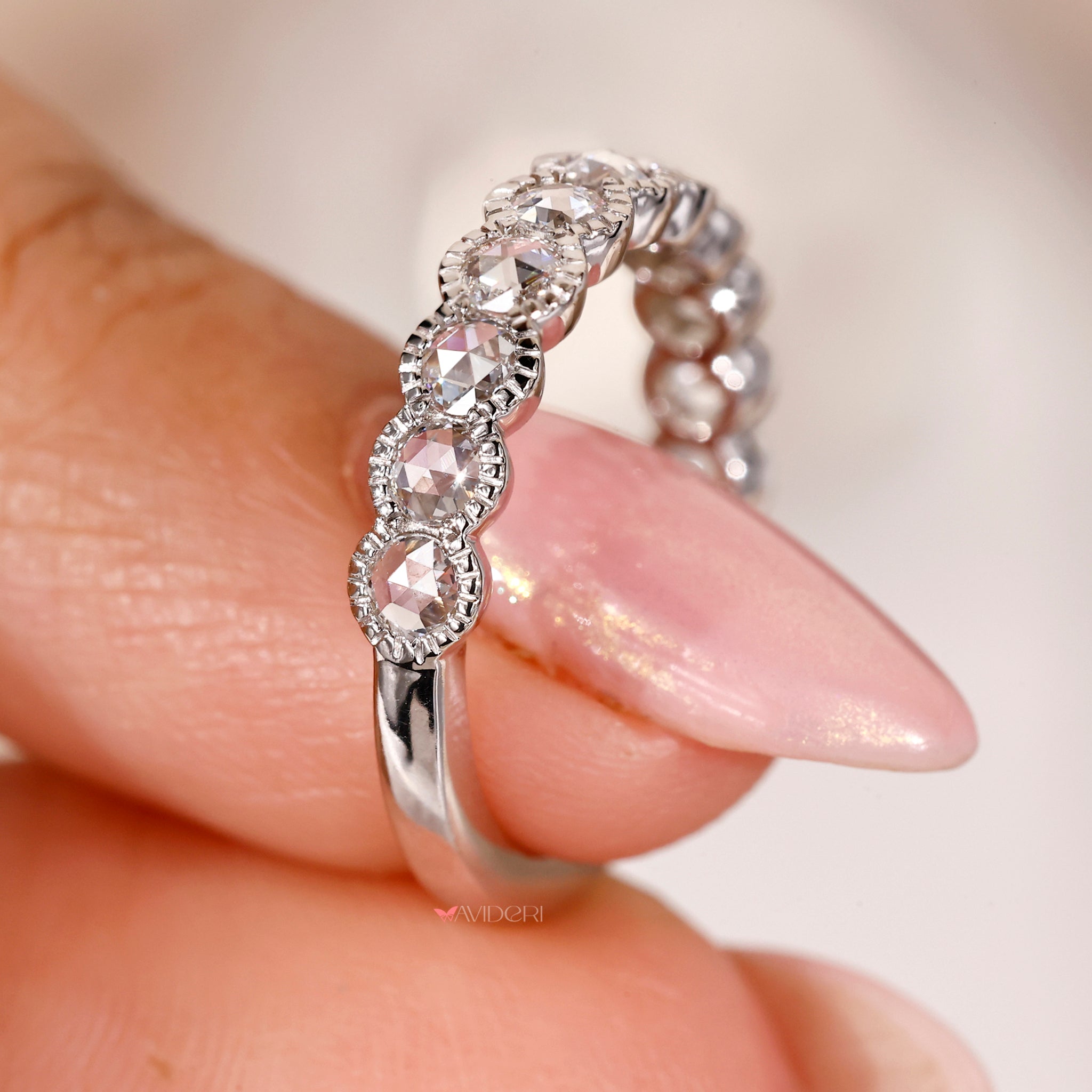Rose cut diamond eternity band with milgrain detailing for a timeless look.
