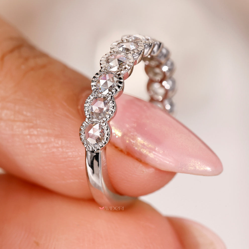Rose cut diamond eternity band with milgrain detailing for a timeless look.
