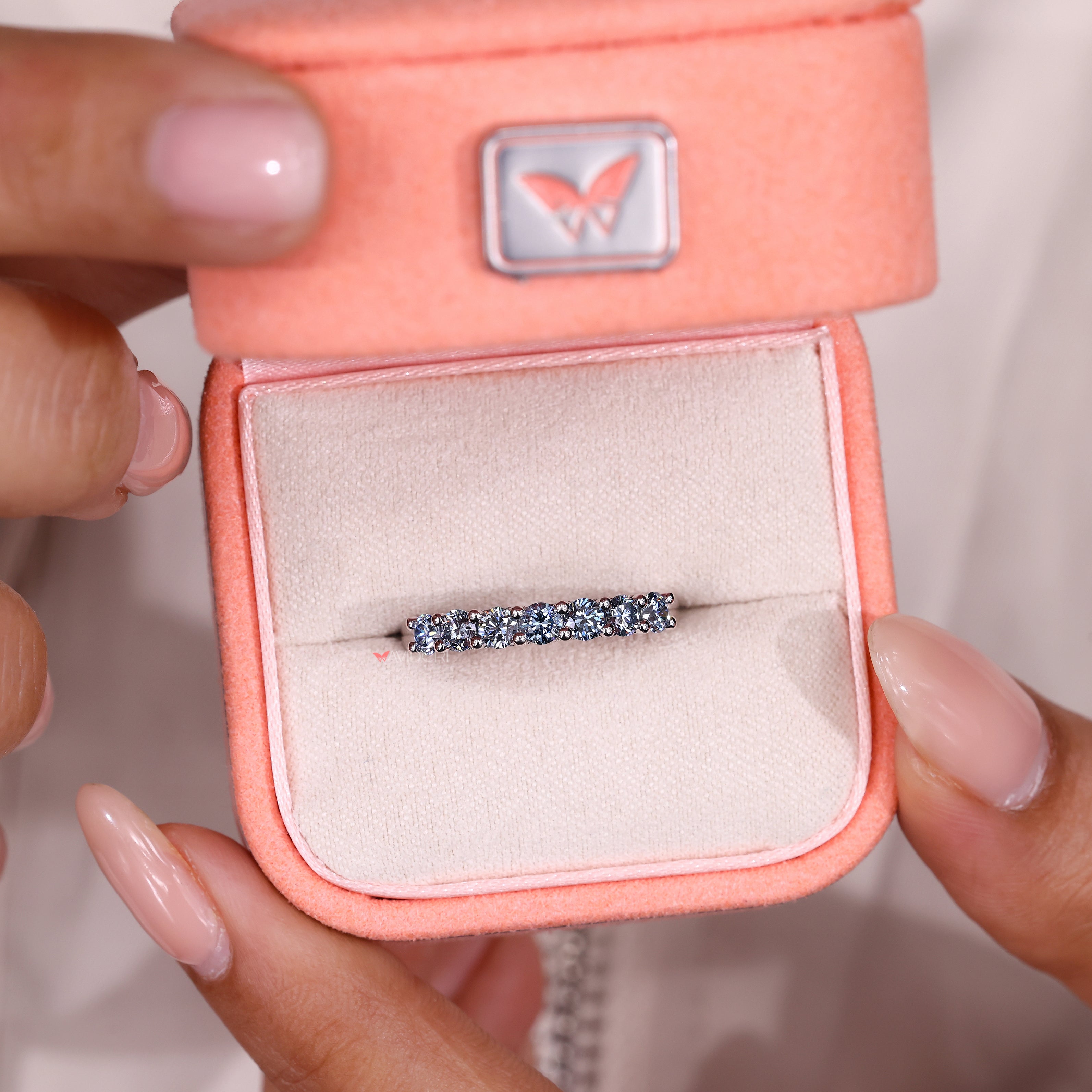 Handmade band with round diamond wedding band.