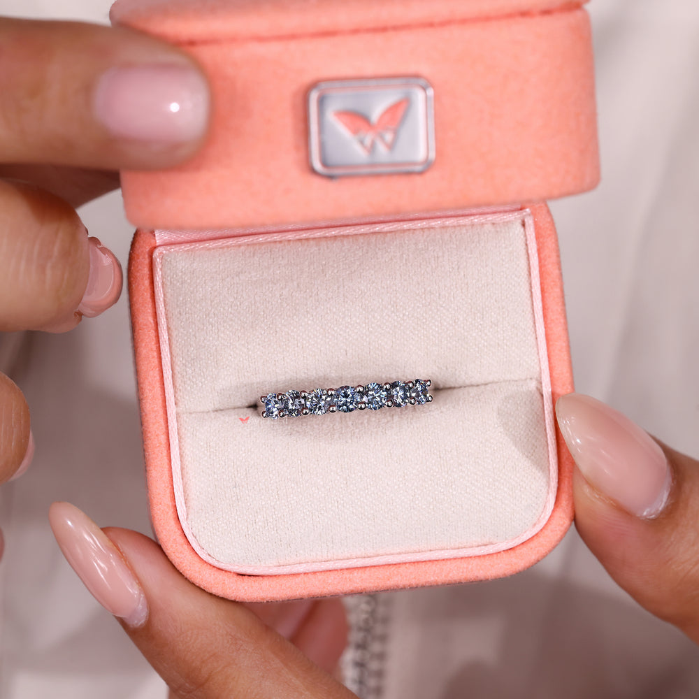 Handmade band with round diamond wedding band.