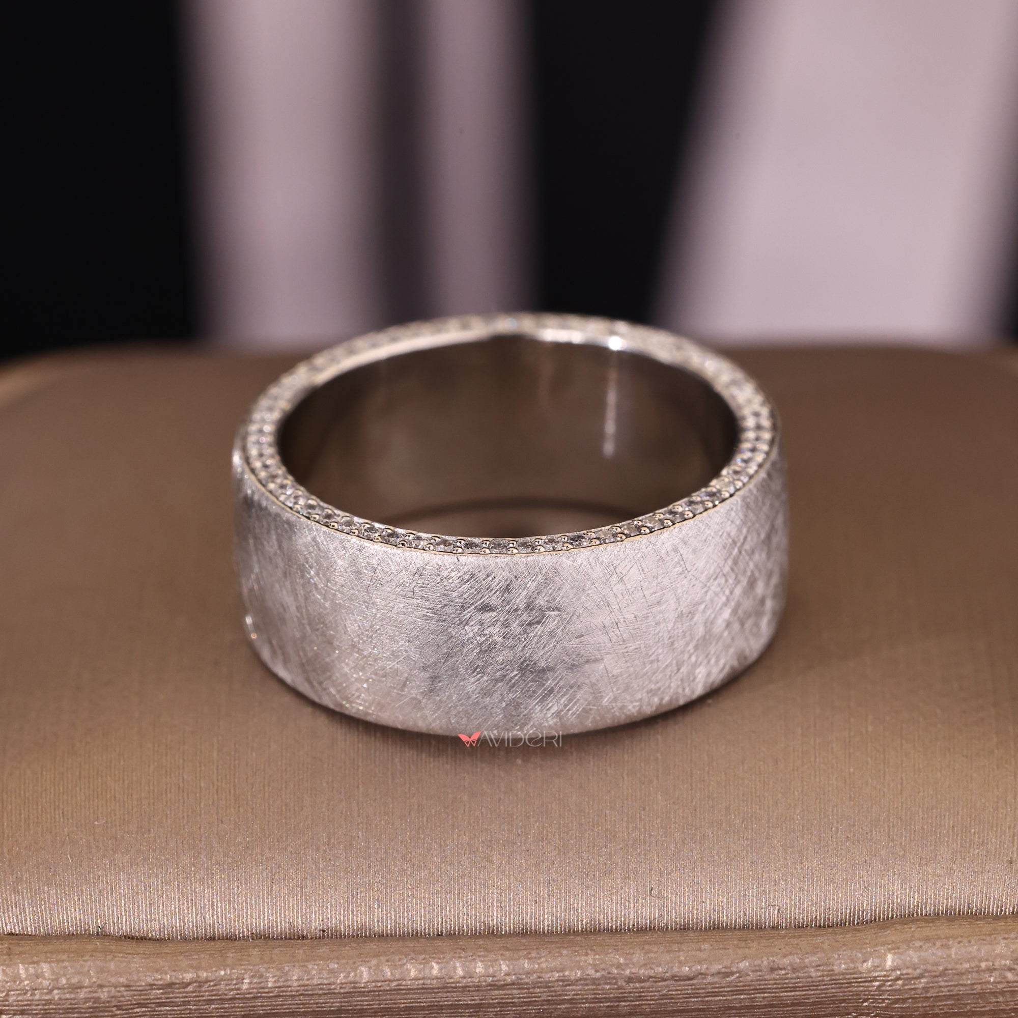 Handmade men’s band with round lab diamonds.