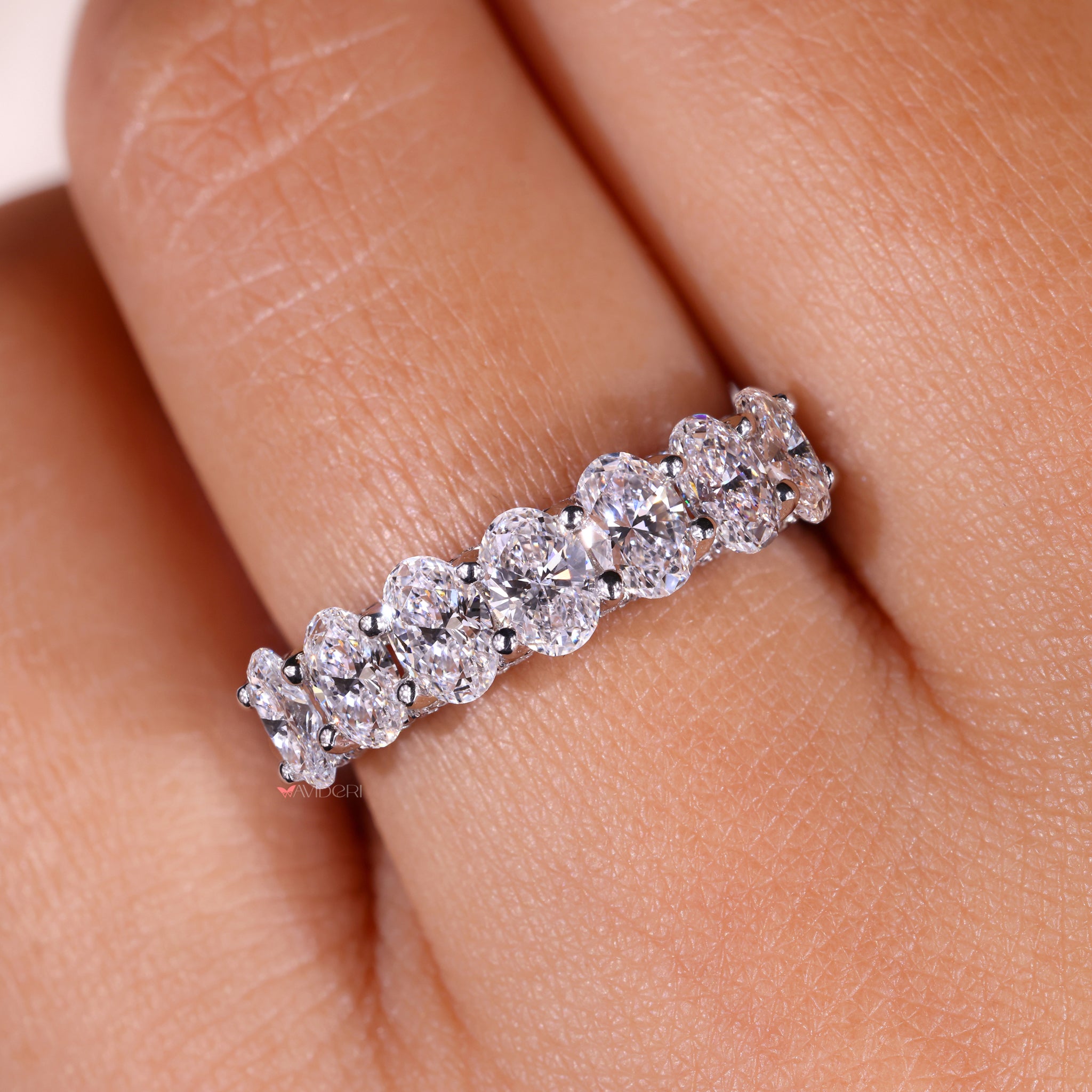 Half eternity band featuring dazzling diamonds for added sparkle
