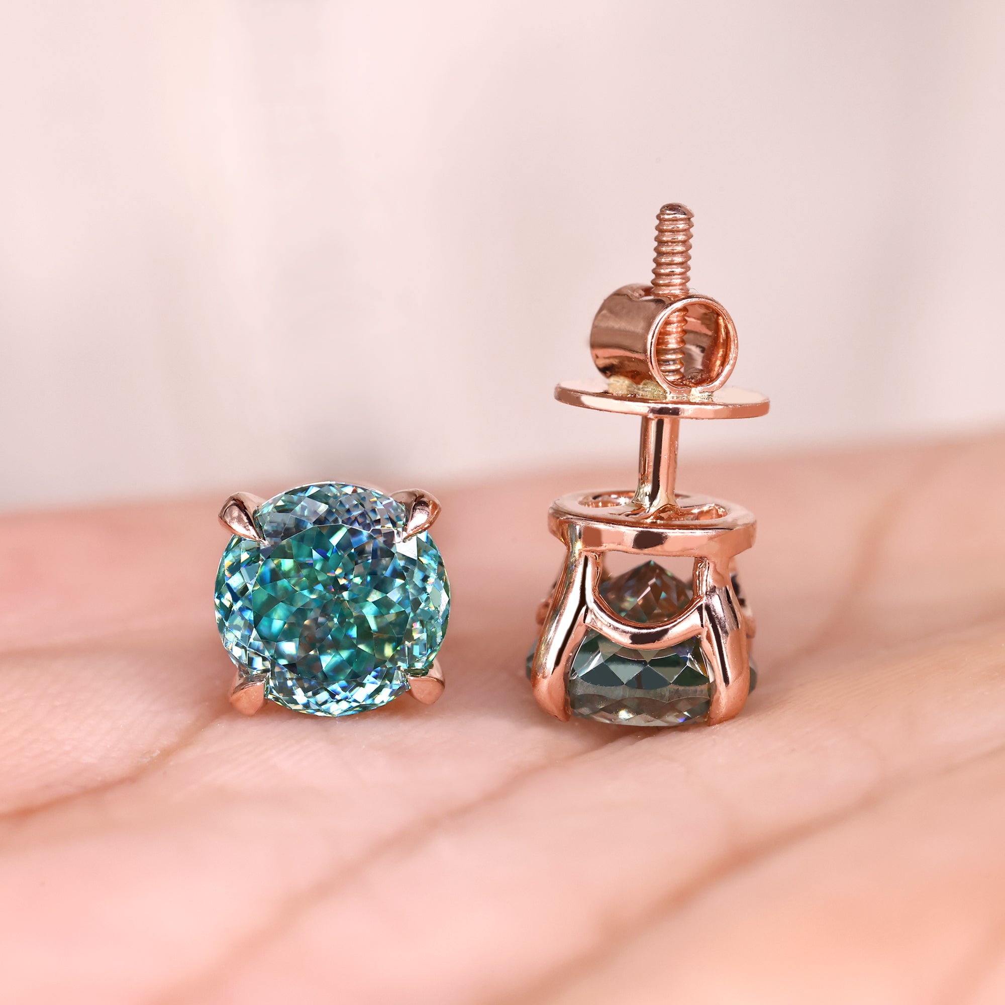 Handmade earrings in rose gold moissanite earrings.