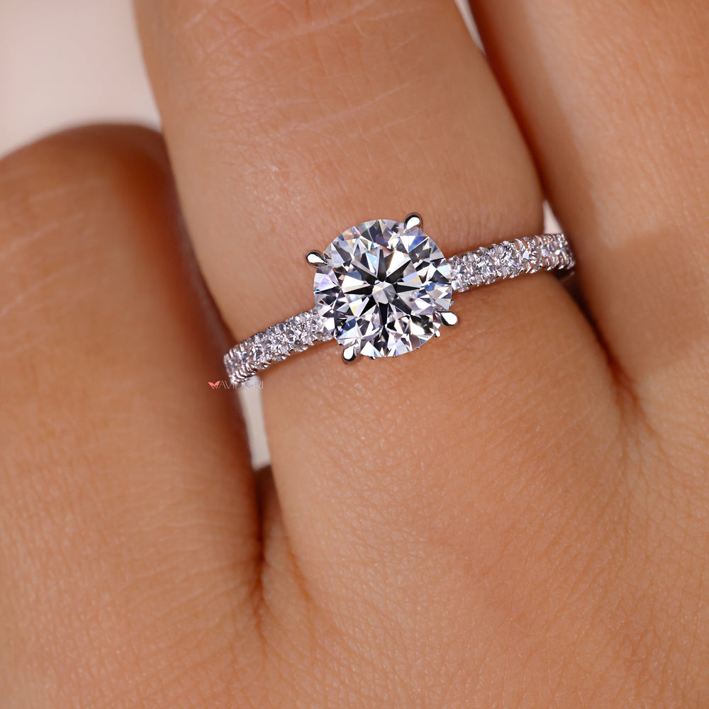 Lab grown diamond in a hidden halo engagement ring, offering sustainable and ethical luxury for modern couples.
