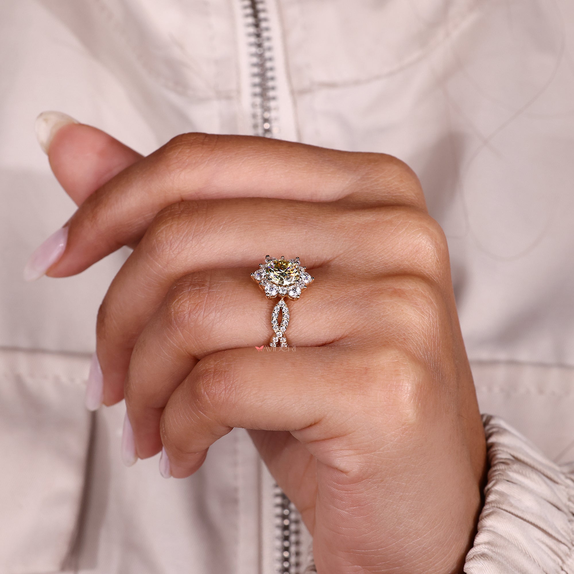 Round engagement ring features a classic shape and bright center stone.
