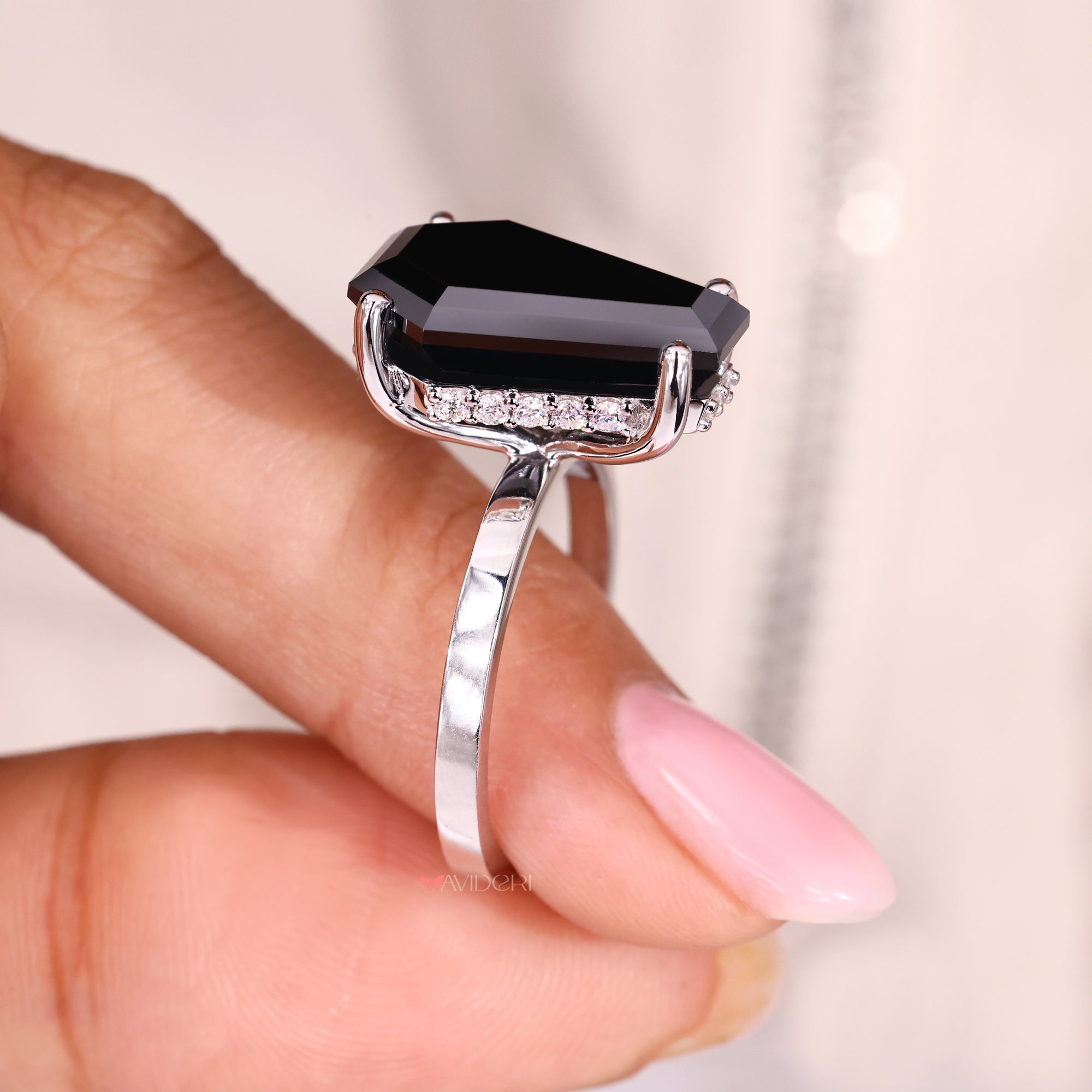 Hidden halo setting gives extra shine with small stones.