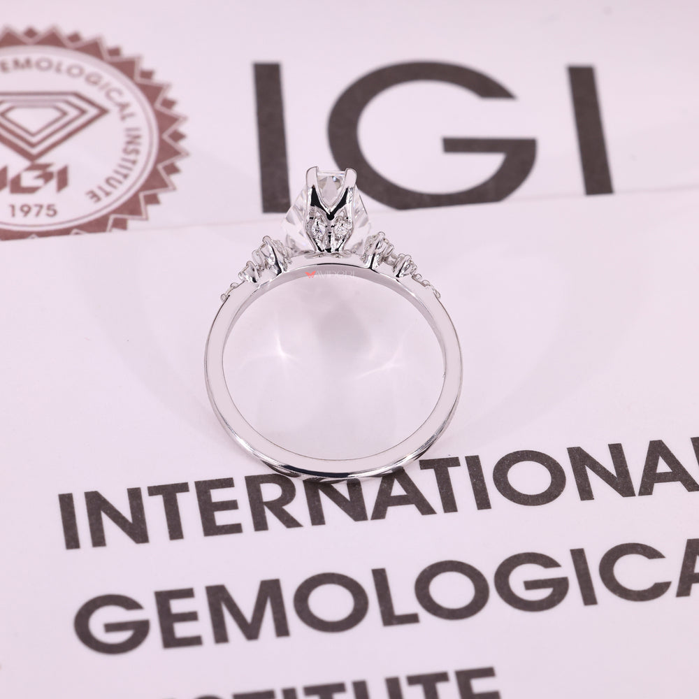 Handmade coffin cut diamond ring with muse setting.