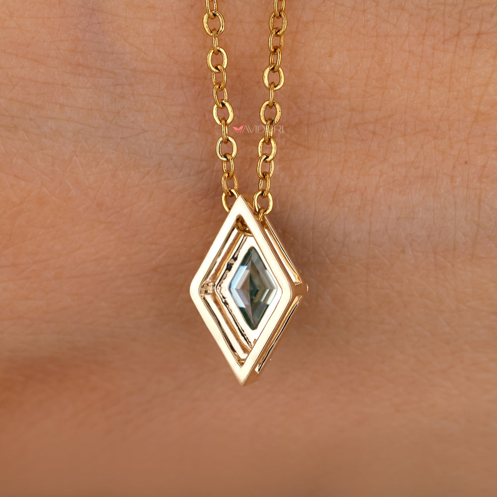 Handmade lozenge cut moissanite pendant.
