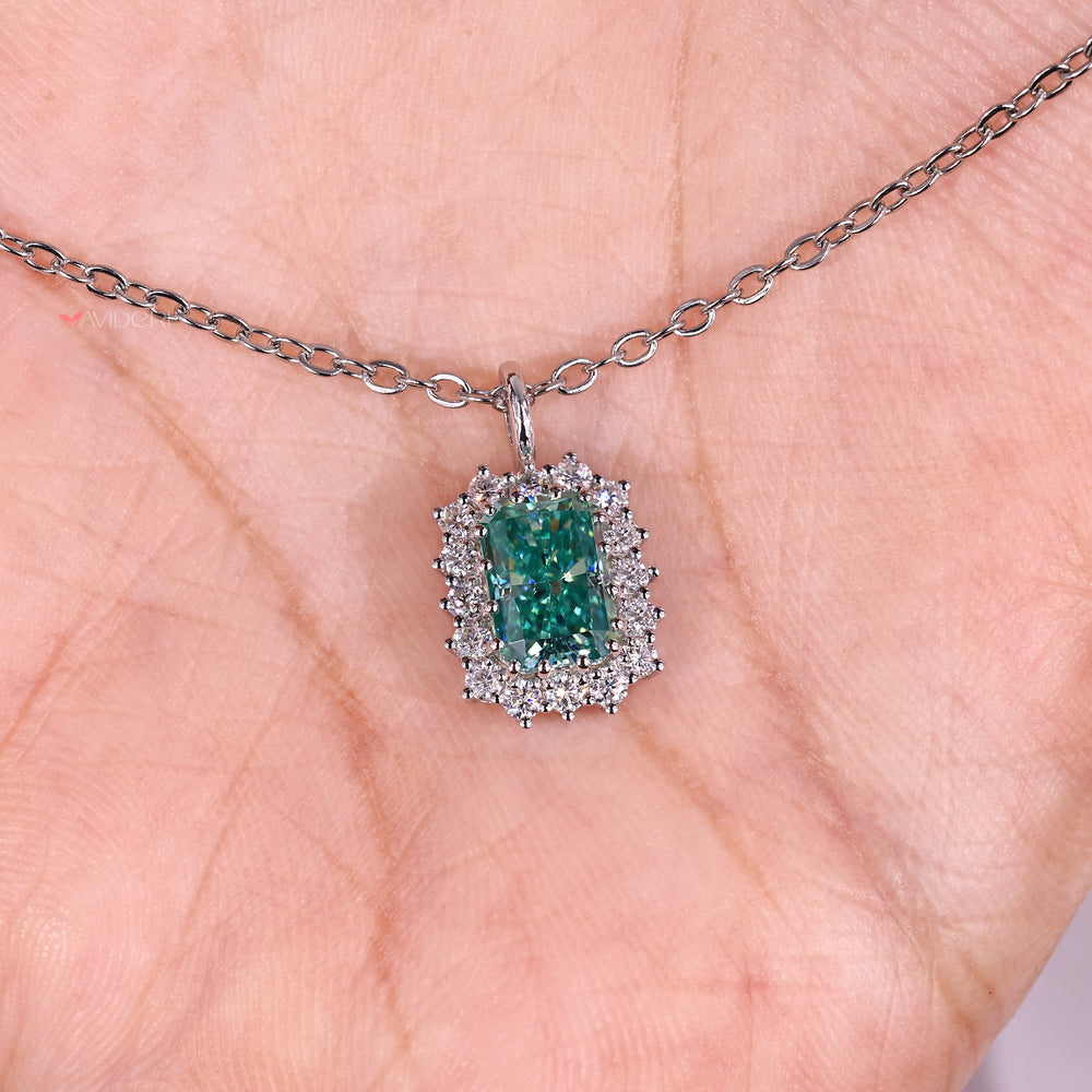 Elegant radiant cut cyan blue moissanite necklace.
