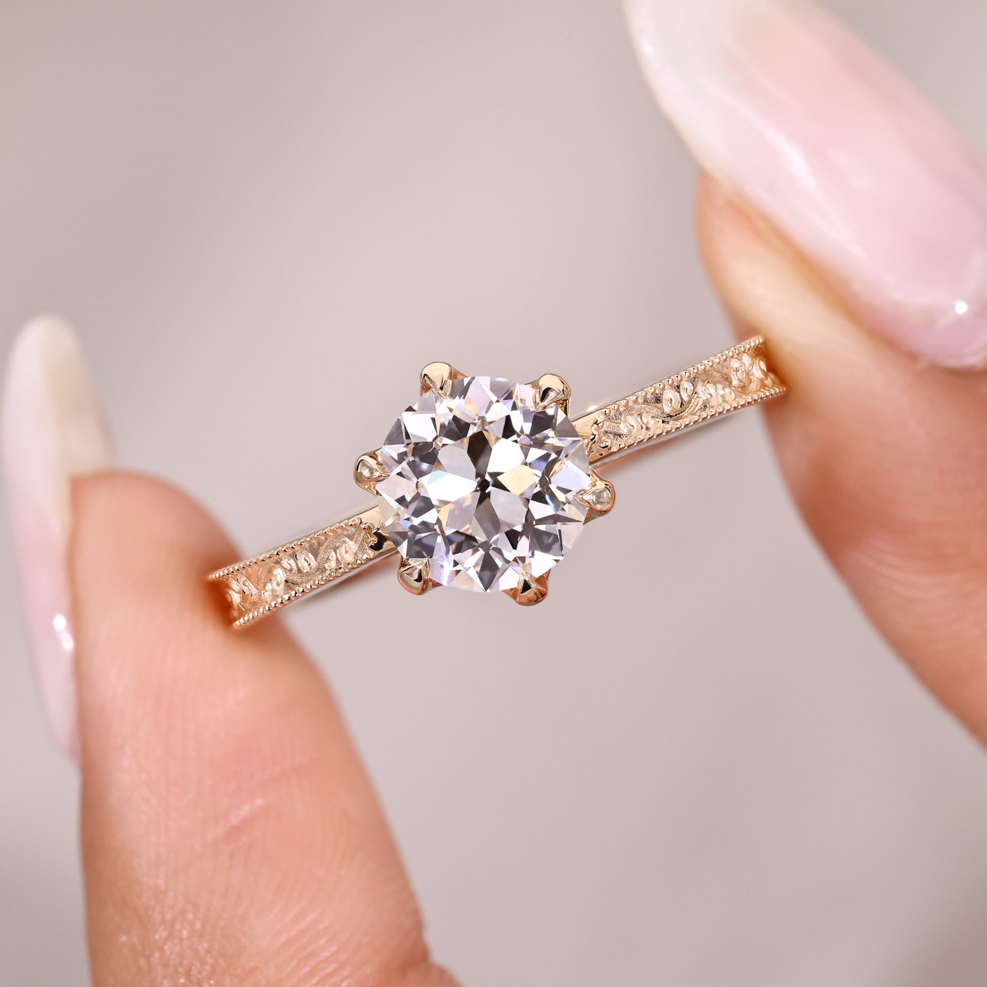 Tulip setting round old European diamond ring.
