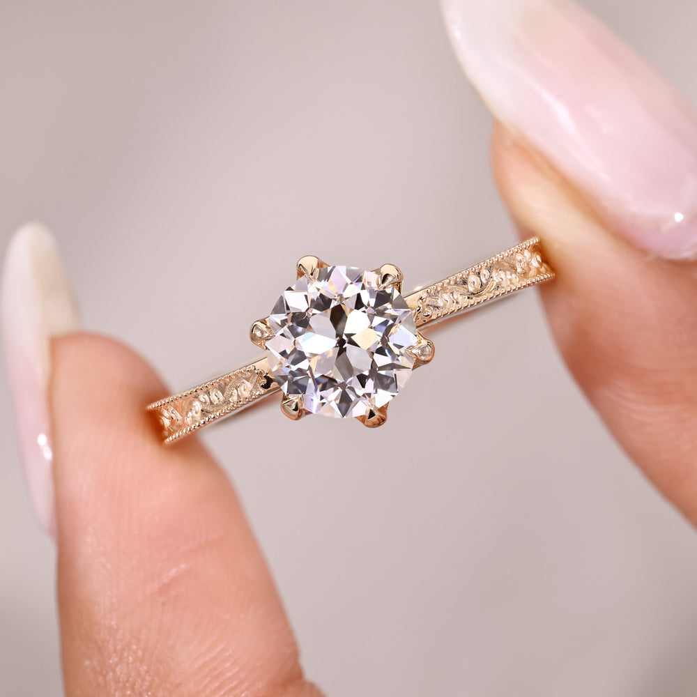 Tulip setting round old European diamond ring.
