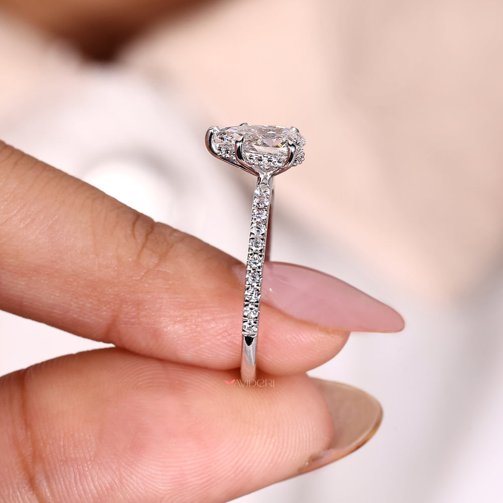 Hidden Halo Ring featuring a pear cut diamond for enhanced brilliance.