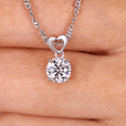 Oval cut solitaire pendant in a handmade jewelry collection.