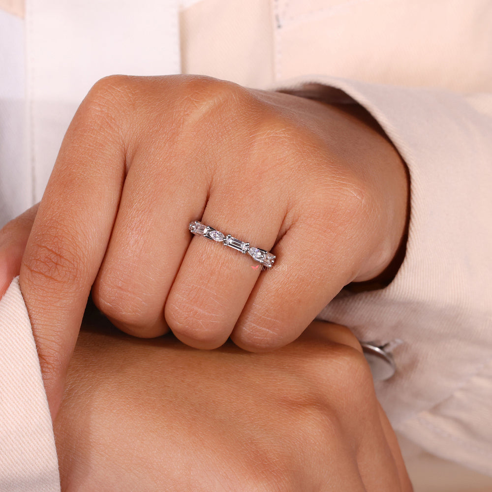 Marquise cut diamond wedding band in white gold.
