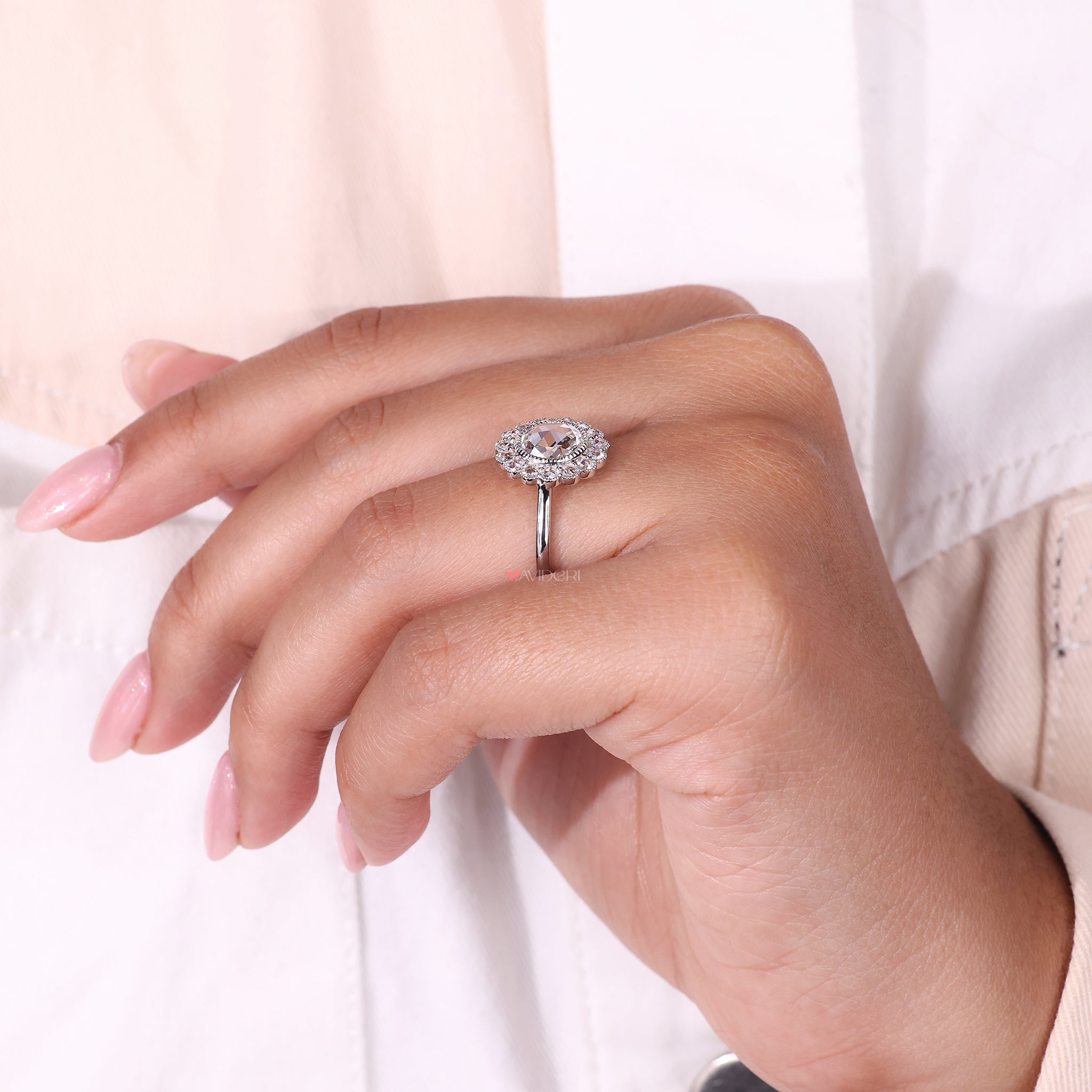 Handmade Jewelry featuring a round rose cut diamond set in a classic white gold ring.