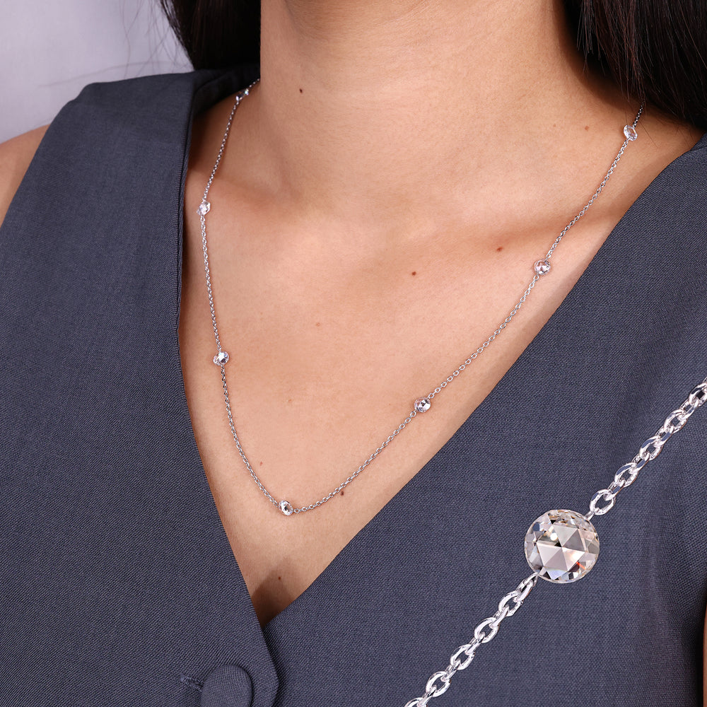 Diamond station necklace in white gold.